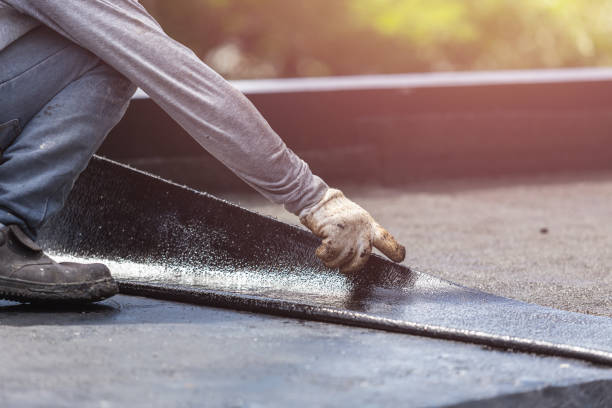 Professional Basement Waterproofing technician working in Louisville, OH